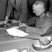 Field Marshall Wilhelm Keitel, signing the ratified surrender terms for the German Army at Russian Headquarters in Berlin, Germany, May 7, 1945.  Lt. Moore. (Army)
NARA FILE #:  111-SC-206292
WAR & CONFLICT BOOK #:  1353