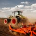 Preparing farmland with seed for next year.